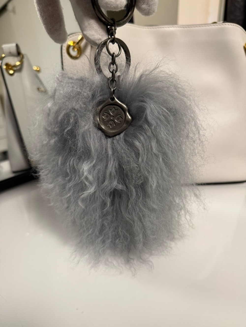 Nordstrom Gray Lamb Wool Pom Keychain with Metal Emblem